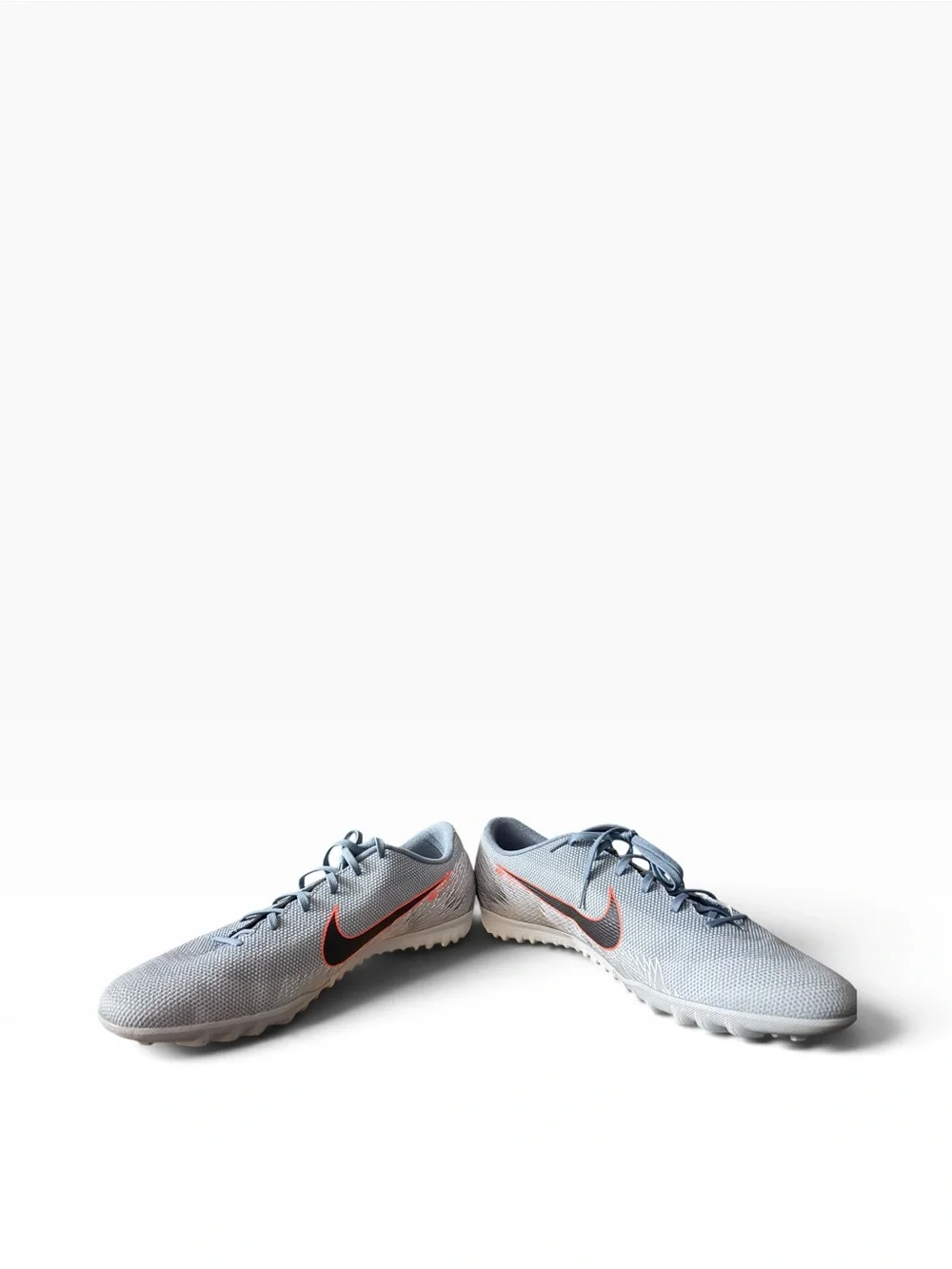 Nike Men’s Gray Athletic Shoes with Orange Accent Swoosh
